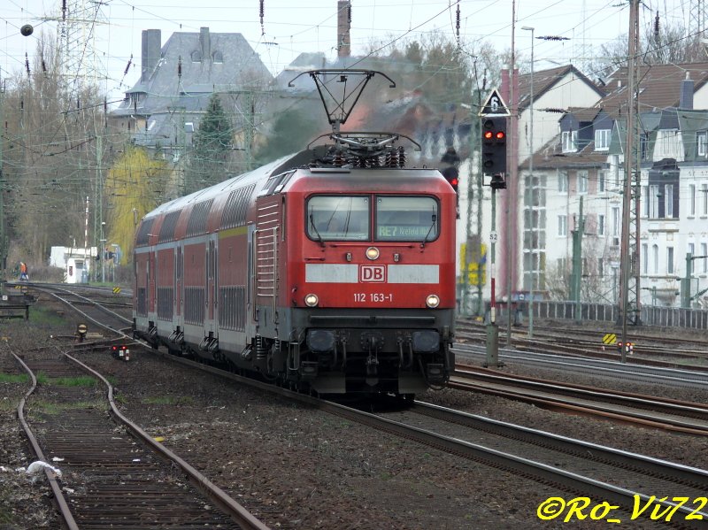 112 163-1 mit RE 7 Rhein-Mnsterland-Express (Rheine - Krefeld). Solingen Hbf. 29.03.2008.