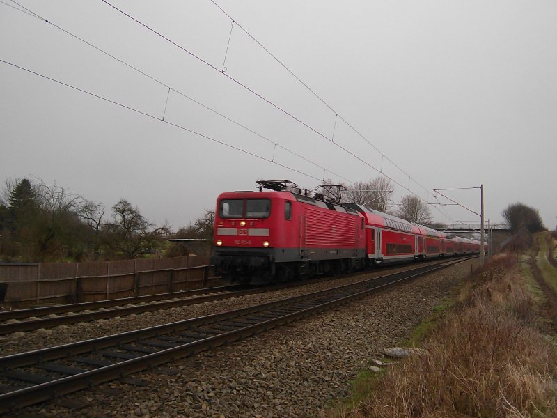 112 175-5 rast am 27.01.09 mit RE 21423 Lbeck Hbf - Hamburg Hbf durch Altenfelde.