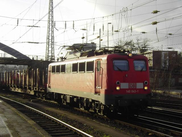 140 043 durchfhrt am Heilige-Drei-Knige Tag 05 Aachen Hbf mit einem Gterzug.