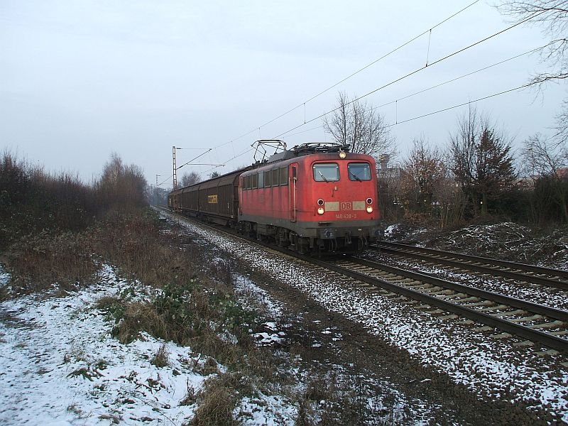 140 438-3 mit 4 Transwaggonwagem am 4.1.2007 durch Limmer Richtung Linden