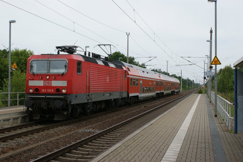 143 113-9 mit ihrer RB nach Leipzig in Burgkemnitz am 19.06.2009