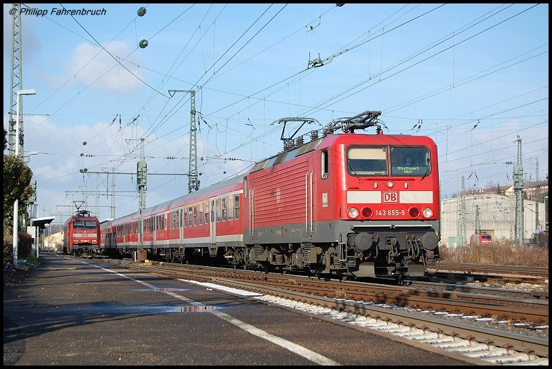 143 655-9 zieht am 16.11.07 RE 19448 von Aalen nach Stuttgart Hbf, aufgenommen bei der Ausfahrt aus dem Aalener Bahnhof.