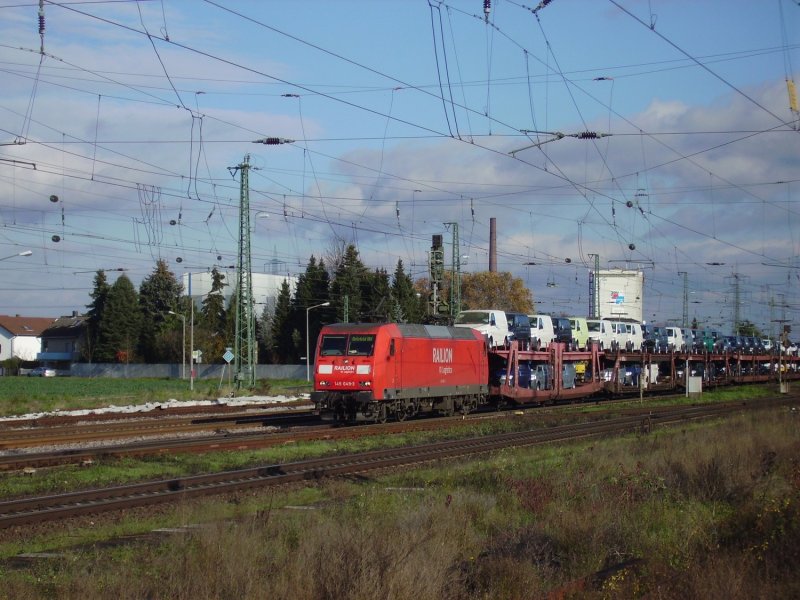 145 049 am 18.11.06 mit einem Umleiter Gterzug in Biblis.