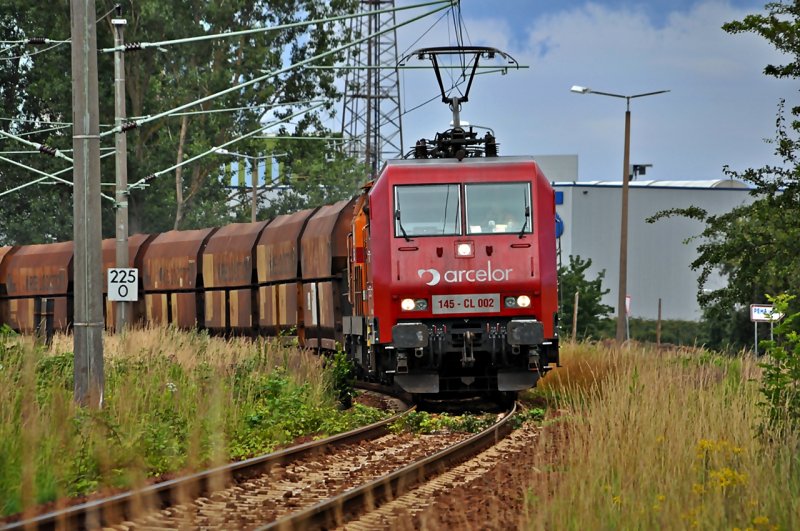 145-CL 002 mit Gipspendel am Abend des 07.07.09 kurz vor dem Abzwg Srg in Stralsund Richtung Sden