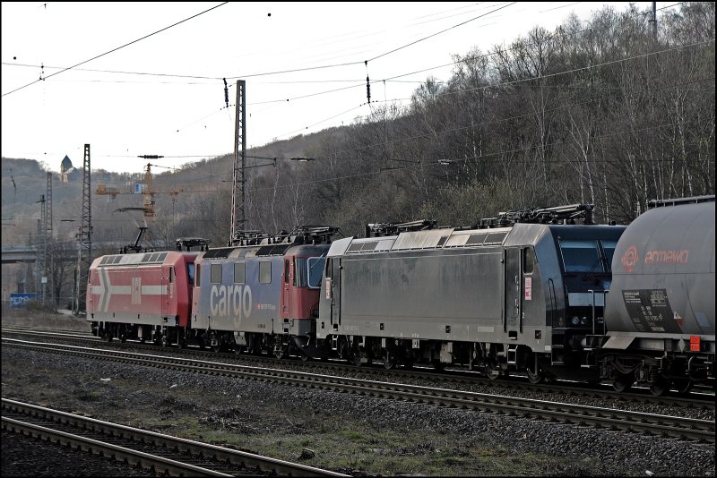 145-CL 012 schleppt eine 421er von SBB Cargo und 185 573 (9480 0 185 573-3) und den DGS 59743 Richtung Frechen. Aufgenommen am Abend des 29.03.2008 in Westhofen.

