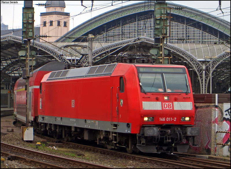 146 011 mit dem RE10127 nach Hamm (Westf.) bei der Ausfahrt Kln Hbf 28.6.2009