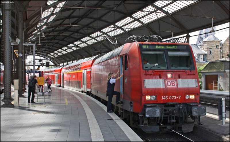 146 023 mit dem RE10129 nach Hamm in Aachen Hbf 30.7.2009
