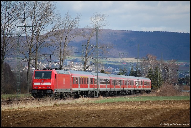 146 226-6 schiebt am 18.03.08 ihren RE 19439 von Stuttgart Hbf nach Aalen, aufgenommen bei Aalen-Essingen an der Remsbahn (KBS 786).