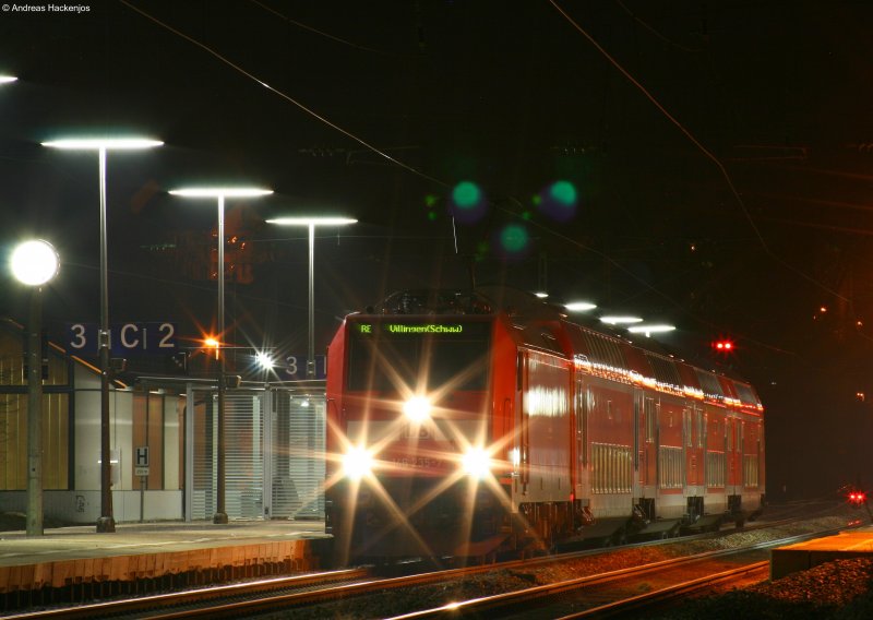 146 235-7 mit dem RE4761 (Karlsruhe Hbf-Villingen(Schwarzw)) bei der Einfahrt St.Georgen(Schwarzw) 4.4.09. Dies ist der letzte Zug vor der Nachtruhe. Abfahrt um 0.23 Uhr