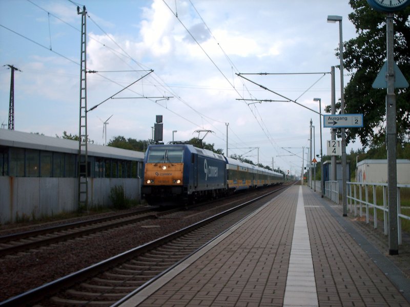 146 521-0 mit X 80004 von WWM(Warnemnde) nach LL(Leipzig Hbf) an einem bewlktem Julitag im kleinen aber schnem Bahnhof Burgkemnitz. Dieser Fhrt spter noch einmal als X 80005 nach Berlin Hbf(tief).