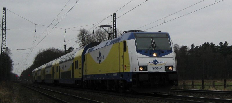 146 534-3 bei der Einfahrt mit MEr 36513 Hamburg-Harburg - Lneburg in Radbruch am 31.01.09.