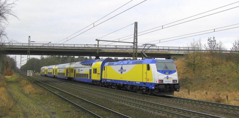 146 534-3 schiebt am 31.01.09 den MEr 36516 Lneburg - Hamburg-Harburg aus Radbruch Richtung Winsen (Luhe).
