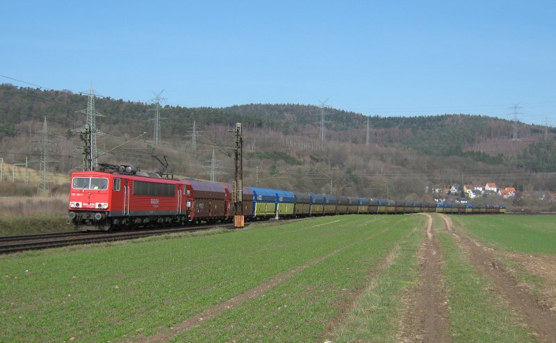 155 183-7 der DB Railion mit einem Koks-Zug der PKP in Fahrtrichtung Sden kurz vor Friedlos. Kurz nach dem das Foto entstand bremste der Zug ohne ersichtlichen Grund scharf ab und hielt neben uns kurz an. 21.03.2009.