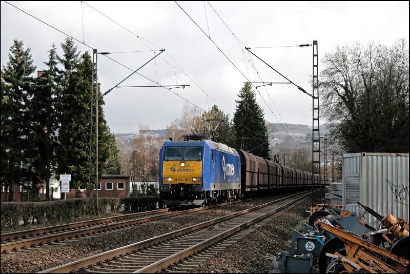 185-CL 003 bringt einen leeren Kohlezug zurck ins Ruhrgebiet. Aufgenommen bei Hohenlimburg am 25.03.2008.