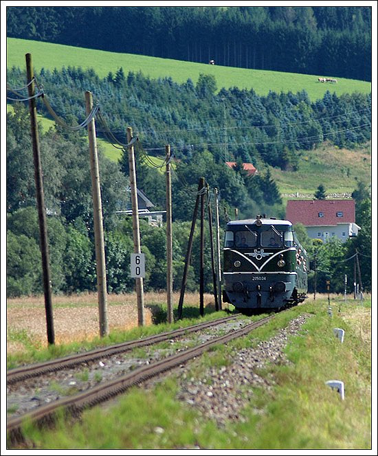 2050.04 mit ihrem SR 19814 von St. Paul im Lavanttal nach Mixnitz am 10.8.2008 zwischen Eppenstein und Weikirchen in der Steiermark.