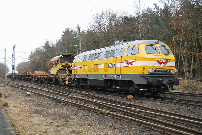 216 032 am zugschluss eines Wiebe Bauzugs am 21.2.09 in Eystrup