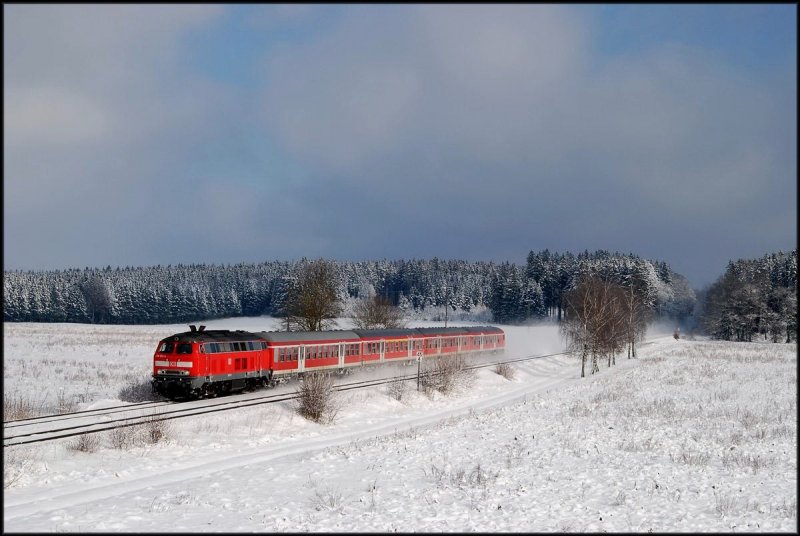 218 313  mit RE 32610 bei Schwabhausen (25.01.2007)