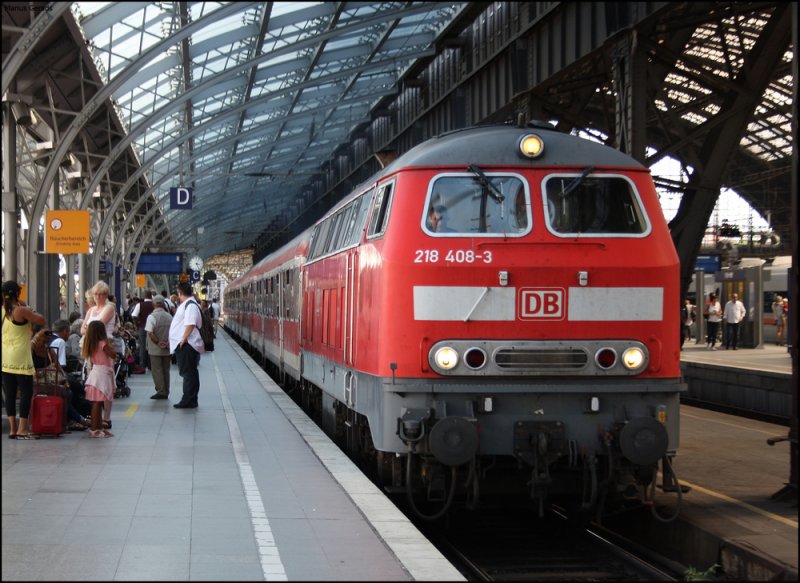218 408 mit dem RE12085 nach Trier bei der Ausfahrt von Kln Hbf 6.8.2009