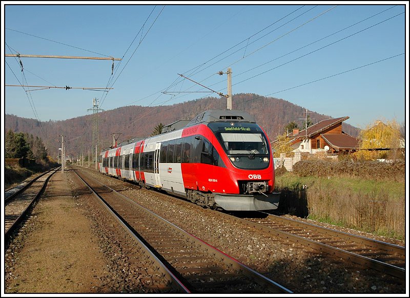 4024 038 als R 4021 von Bruck an der Mur nach Spielfeld-Stra am 24.11.2006 kurz vor Erreichen den Grazer Hauptbahnhofes. Die Aufnahme entstand in Graz-Gsting.