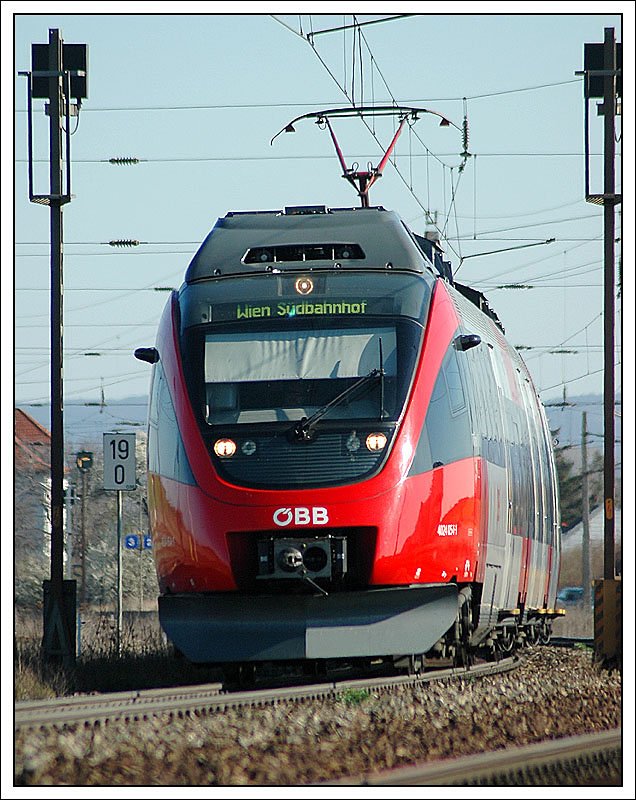 4024 054 als REX 7624 von Bratislava-Petrzalka nach Wien am 11.3.2007 bei der Ausfahrt aus Gramatneusiedl.