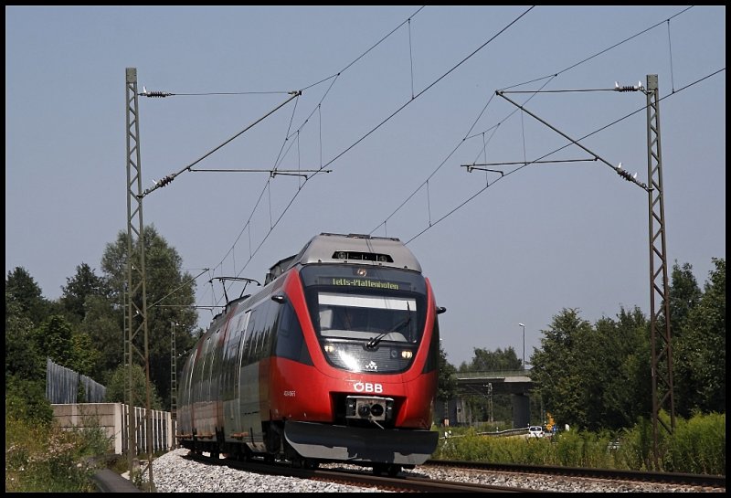 4024 066 ist als RB 5119, Rosenheim - Telfs-Pfaffenhofen, bei Pfrauendorf unterwegs. (01.08.2009)