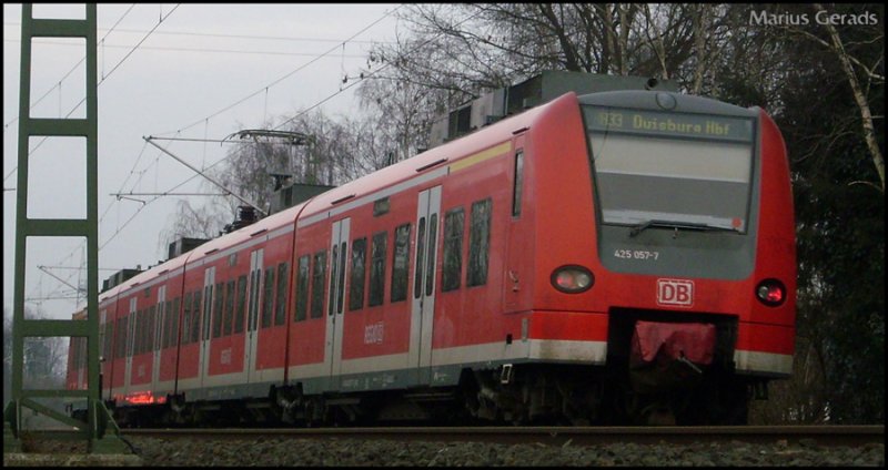 425 057-7 als RB11074 nach Duisburg Hbf bei der ausfahrt von Geilenkirchen. 1.3.2009
