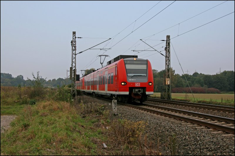 426 021/521 und 426 523/023 fahren als RE16 (RE 29681)  RUHR-SIEG-EXPRESS  nach Siegen. (10.10.07)