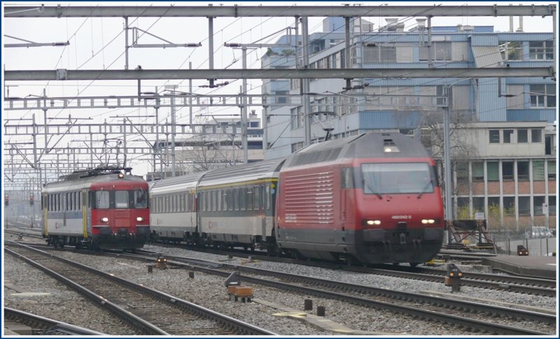 460 032-5 berholt einen allein fahrenden RBe 4/4 540 057-7 in Zrich Altstetten. (31.03.2009)