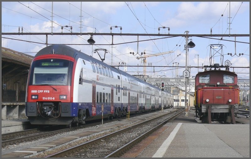 514 010-8 trifft Ee 3/3 16390 in Rapperswil. (18.03.2008)