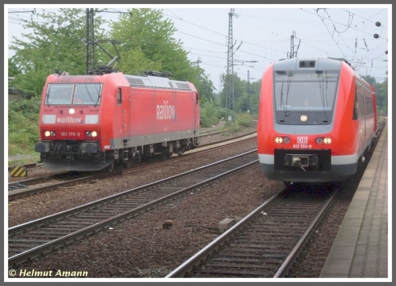 Am 13.09.2008 f�hrte 185 179 im Rahmen des 150j�hrigen Jubil�ums der Hessischen Ludwigsbahn auch F�hrerstandsmitfahrten durch. Der RE aus Saarbr�cken fuhr gerade mit 612 053 und 612 054 in den Bahnhof ein, als die 185 gerade die Fahrtrichtung umgeschaltet hatte. 
