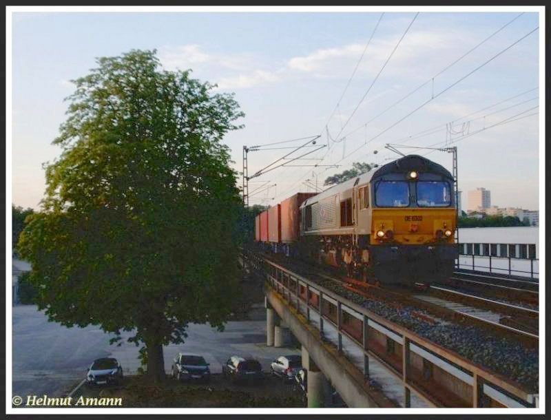 Am 29.07.2008 kam DE 6303 der Dillen & LeJeune Cargo mit einem Containerzug aus Richtung des DB Umschlagbahnhofes Frankfurt am Main Ost, aufgenommen bei Auffahrt auf die Deutschherrnbrcke. 