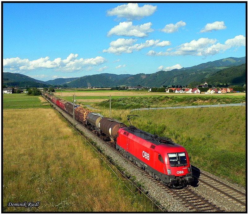 Auf dem Weg nach Villach Sd Gvbf befindet sich die 1116 072 mit dem DG 54575 von Graz-Vbf,bei St. Margarethen. 19.07.2008