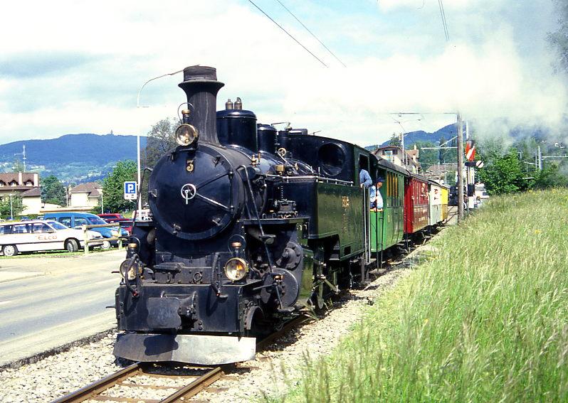 BC Museumsbahn DAMPFZUG 327 von Vevey nach Weiche -(Chaulin) am 23.05.1999 bei Blonay mit Zahnrad-Dampflok exBFD HG 3/4 3 - exCEG C 23 - exCEV BC21 - ex MOB C4 45 - exRhB As 2.

