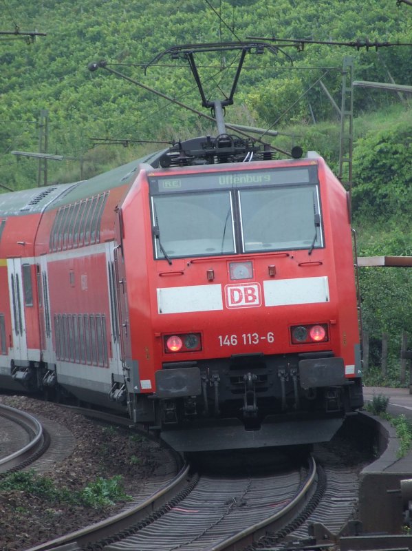 BR 146 113 schiebt einen RE nach Offenburg aus dem Bahnhof Istein am 28.08.2008.