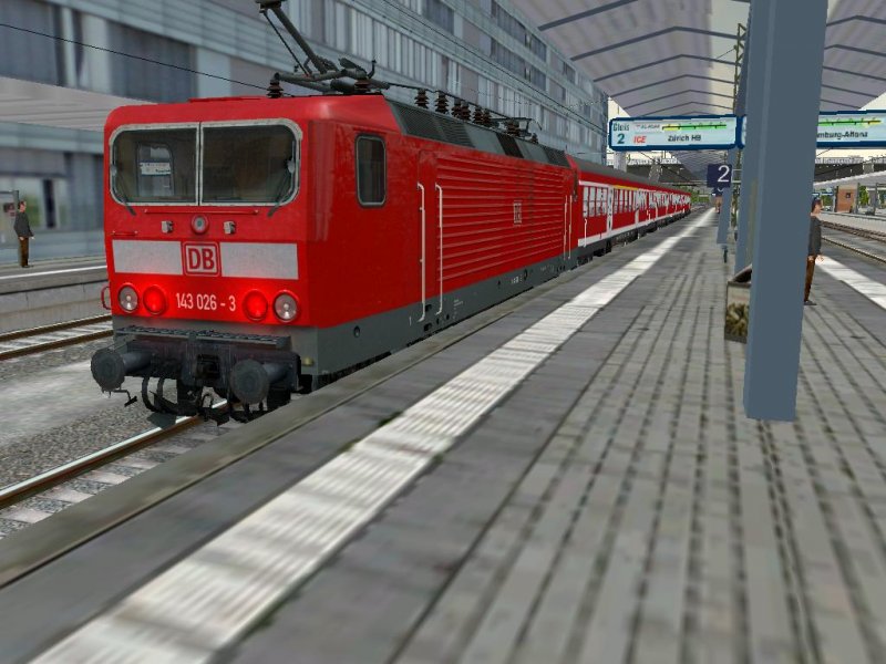 BR143 (026-3)schiebt hier einen RB-Zug nach Karlsruhe, sie warted in Basel auf Abfahrt.