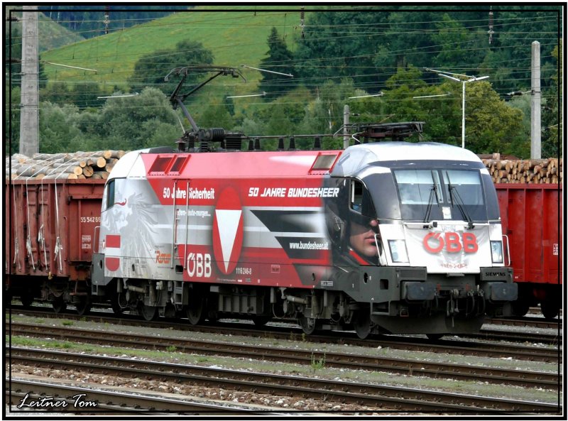 Bundesheer Taurus 1116-246 fhrt mit einem Holzzug in den Bahnhof Knittelfeld ein.
18.08.2007