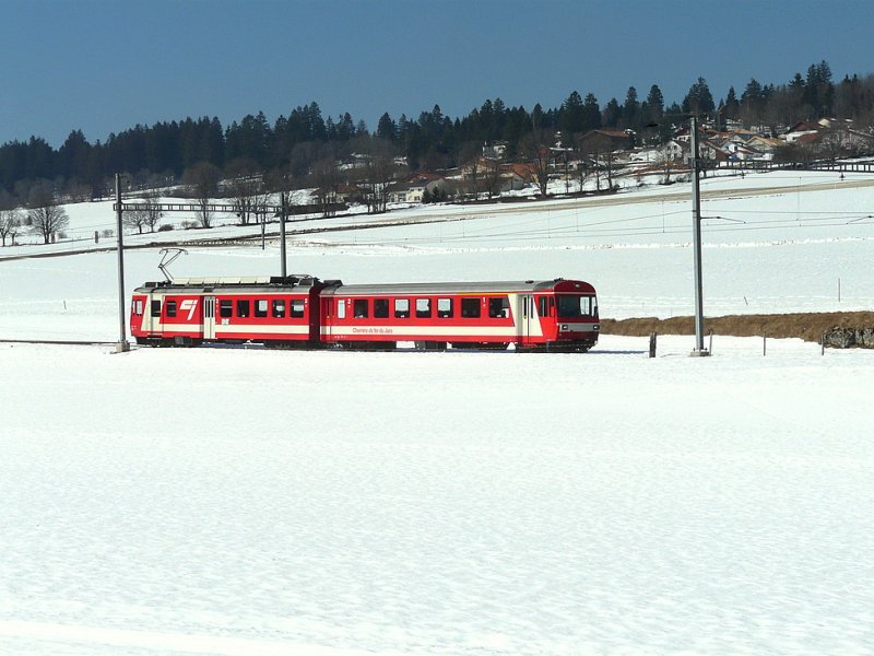 CJ - Regio mit Steuerwagen ABt 714 und Triebwagen BDe 4/4 614 unterwegs bei Pre-Petitjean am 21.03.2009