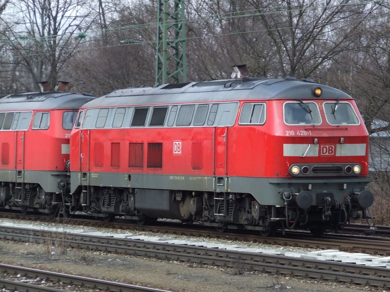 DB 218 428-1 zieht am 20.03.2009 einen SBB EuroCity durch Mnchen-Pasing in Richtung Mnchen Hbf.