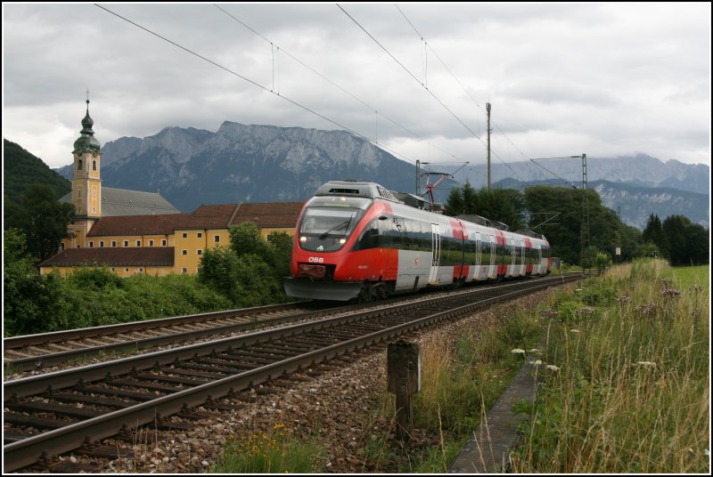 Der Innsbrucker 4024 087 fhrt beim Kloster Reisach als RB 5112 von Innsbruck nach Rosenheim. 