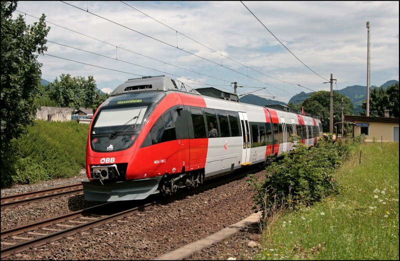 Der Innsbrucker 4024 138 erreicht als R 5116, von Telfs-Pfaffenhofen komment, den Haltepunkt Mnster-Wiesing. (05.07.2008)
