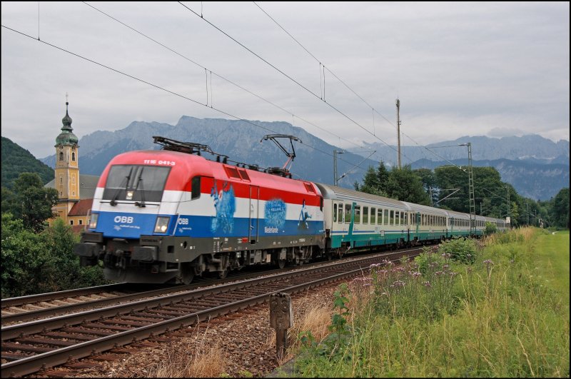 Der Niederl�nder am Michelangelo: 1116 041  Niederlande  wird mit dem IC 84  Michelangelo , von Rimini nach M�nchen Hbf, vor dem Kloster Raisach abgelichtet. (04.07.2008) 


