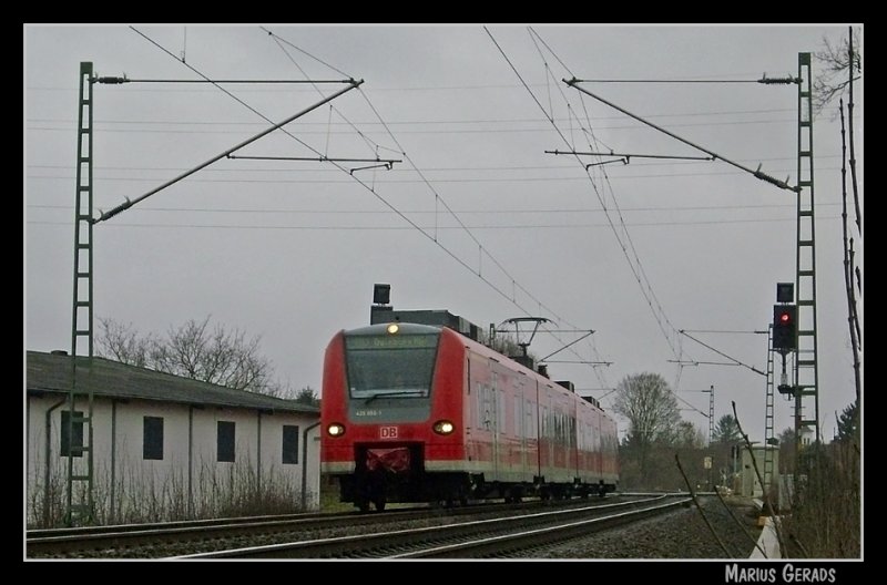 Der plage Geist des letzen Sommers ist zurck: 425 055/555 als RB 11066 ( Rhein-Niers-Bahn ) von Aachen nach Duisburg. Hier am Esig von Geilenkirchen (18.1.2009)