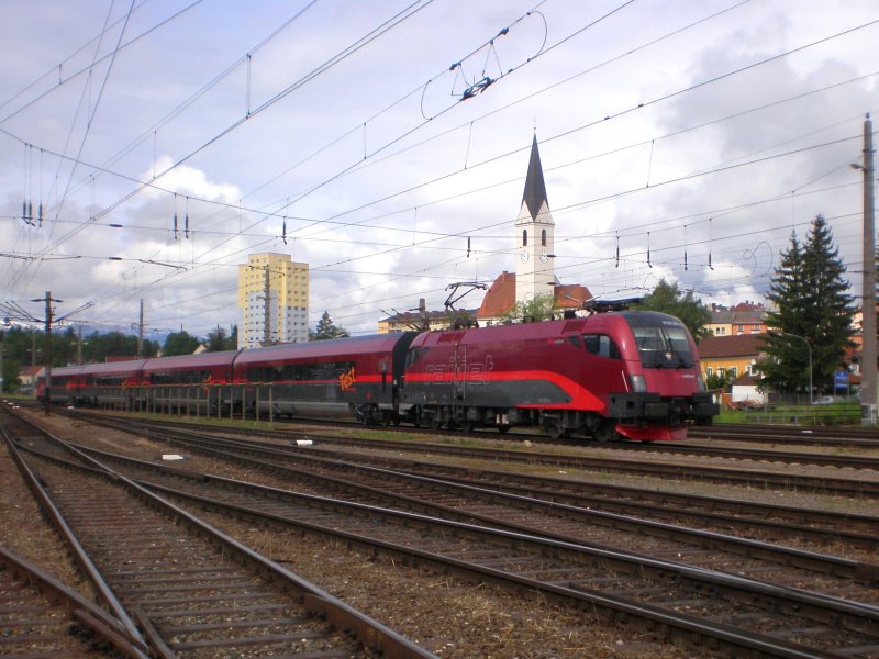 Der Railjet Messzug SPROB 93428 mit Zuglok 1116.201 bei Testfahren zwischen Unzmarkt und St. Michael im Bahnhof Knittelfeld. (19.05.2008)