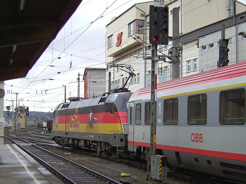 Die 1116 036 EM Taurus Deutschland am 02.02.2008 bei der Ausfahrt aus Salzburg Hbf mit dem EC 115 „Wrtersee“.  