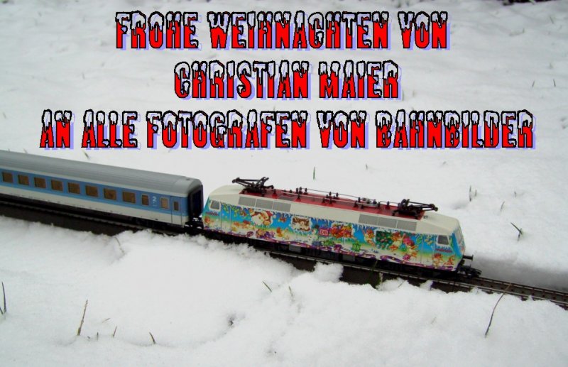 Die 120 129 Weihnachtslok mit einem IR im Tiefschnee.