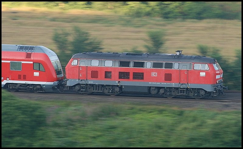 Die 218 427 konnte ich am 24.Juli 2008 als Mitzieher festhalten. Aufgenommen bei Lonsee. Der Zug fuhr als 218er-Sandwich nach Stuttgart Hbf.