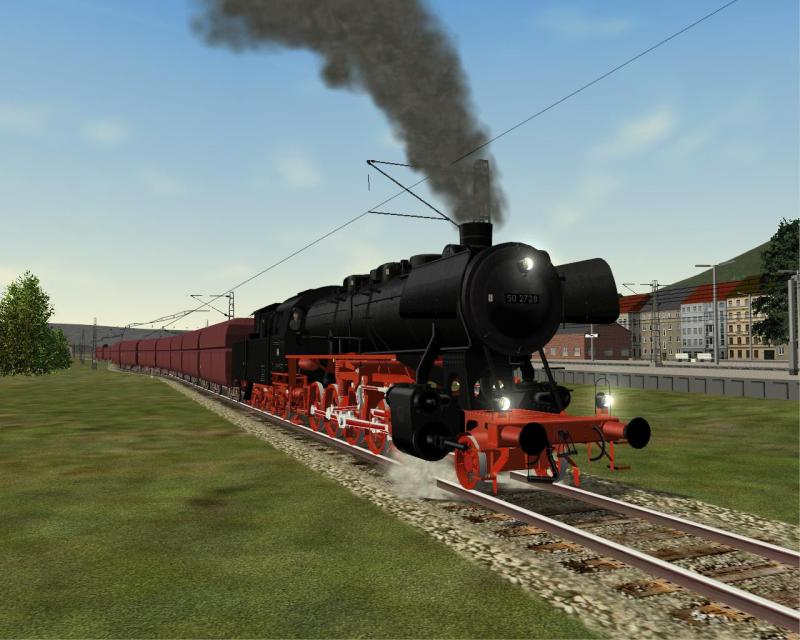 Die DB BR 50 2728 mit Kabinentender zieht ihren schweren Kohlezug aus dem Abstellbereich des Bahnhofs Ehrang.