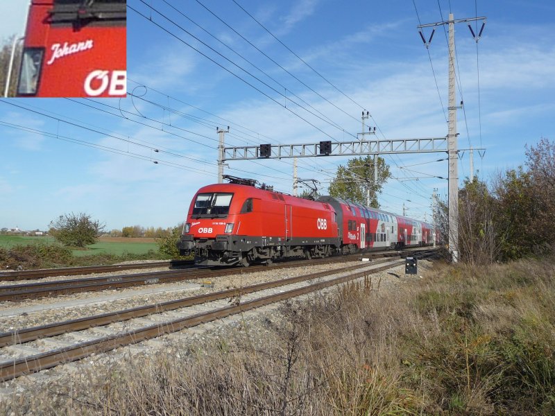 Die Lokomotive der Baureihe 1116 139-5 mit Wiesel-Waggons ist am 30.10.2008 auf der Nordbahn unterwegs. Auff�llig ist die Beschriftung  Johann  (vergr��ert links oben). (bitte um Kommentare)