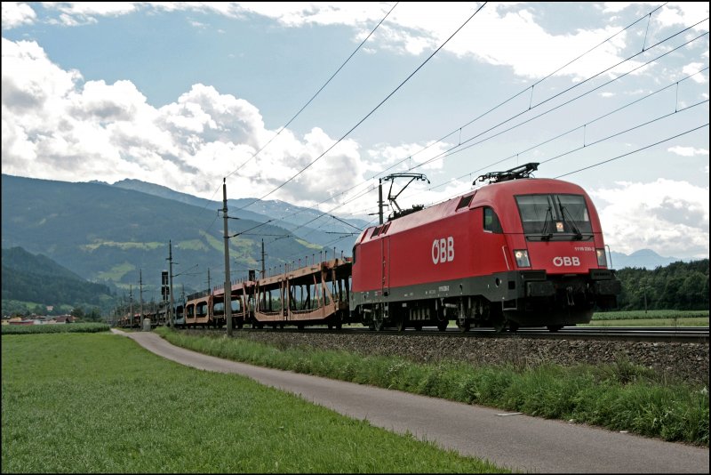 Die saubere Wiener 1116 230 bringt leere Autotransporter von Buchs(SG) (?) in Richtung W�rgl. (08.07.2008)
