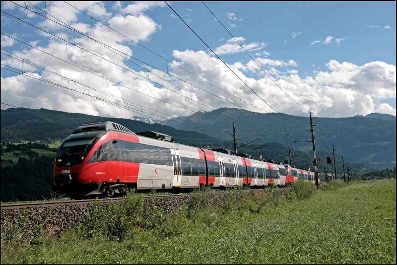 Doppel-talENTE: Die beiden Innsbrucker 4024 057 und 4024 089 sind als R 5124 (ab Kufstein als RB 5214) von Innsbruck Hbf nach Rosenheim untewegs. Ab Kufstein wird 4024 057 alleine weiter nach Rosenheim weiterfahren. (08.07.2008)

